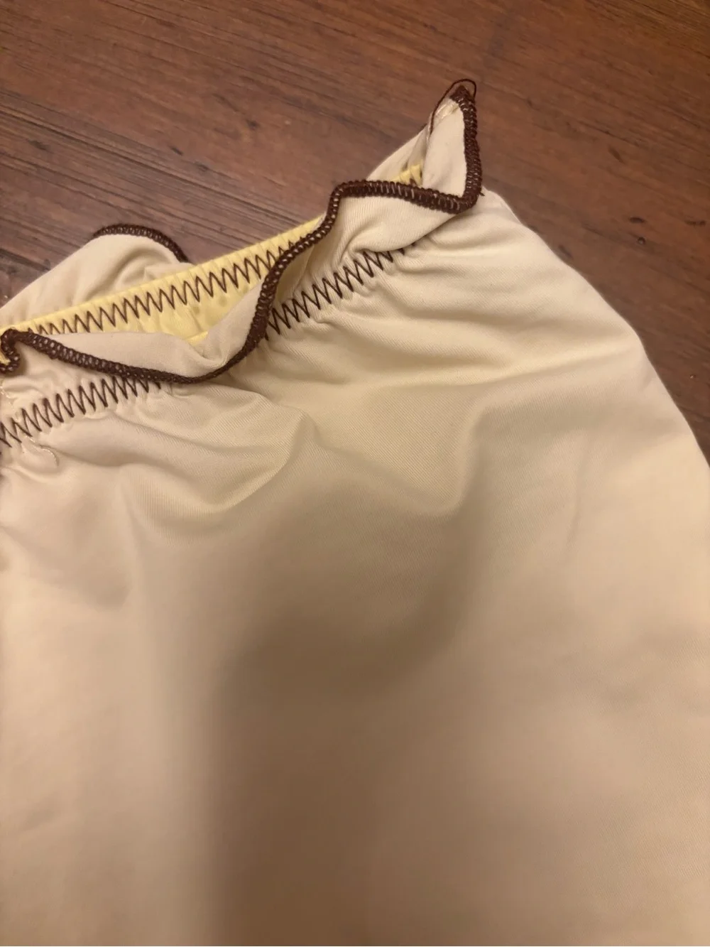 Frankie’s bikinis x Gigi HADID yellow swim shorts with brown trim